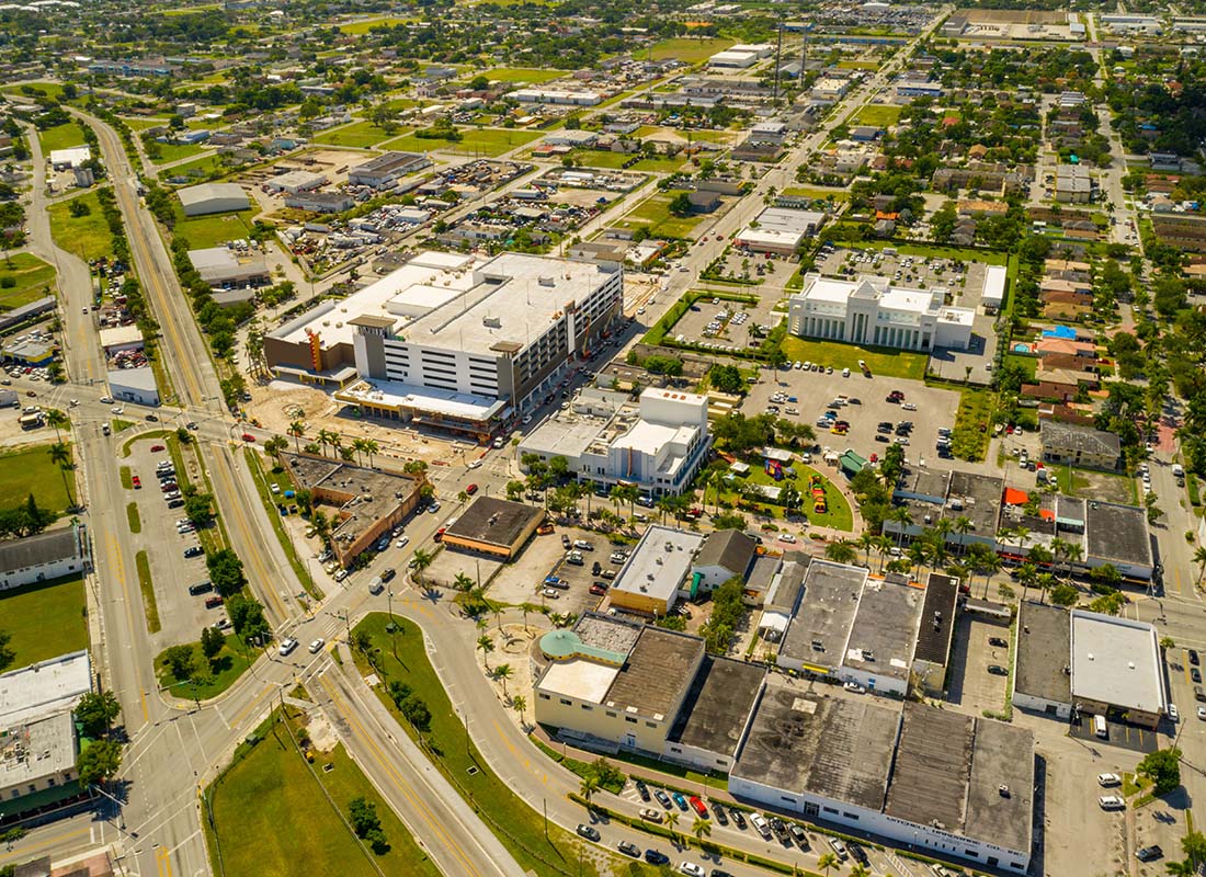 North Homestead, FL - Aerial View of Commercial Buildings and Homes Near a Highway in Downtown North Homestead Florida on a Sunny Day
